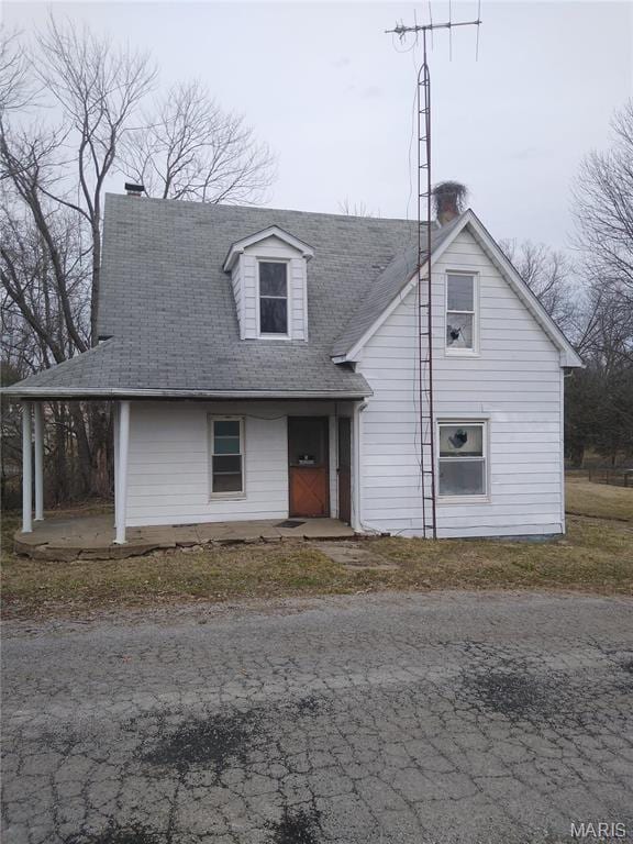 607 E Hancock St, Steeleville, IL 62288 - view of front of home with a chimney and roof with shingles