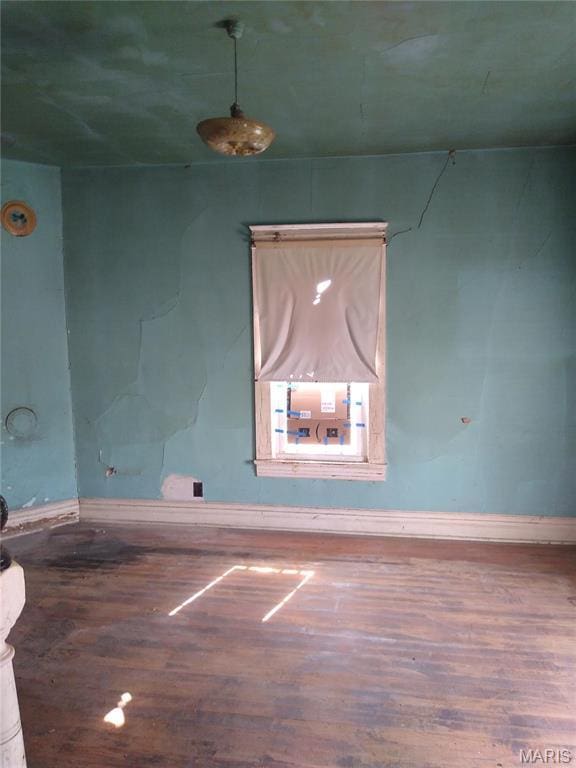 607 E Hancock St, Steeleville, IL 62288 - spare room with wood finished floors and baseboards