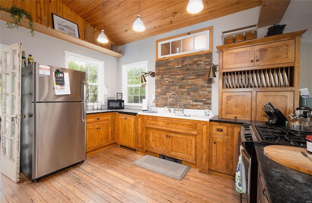 19530 County Road 3620, St James, MO 65559 - kitchen with stainless steel appliances, light wood-style flooring, a sink, wood ceiling, and brown cabinetry