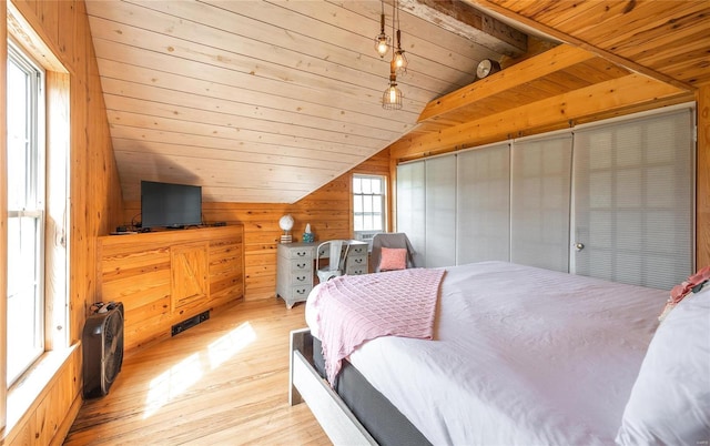 19530 County Road 3620, St James, MO 65559 - bedroom with vaulted ceiling, wooden walls, wood finished floors, and wood ceiling