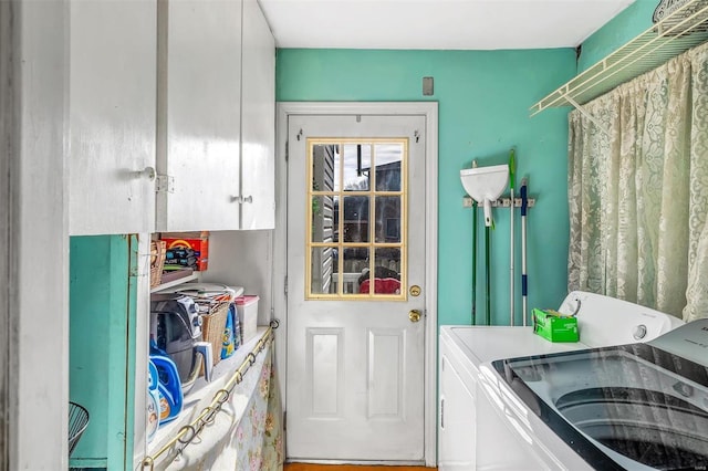 105 W Ave, Eureka, MO 63025 - clothes washing area with washing machine and dryer and cabinet space