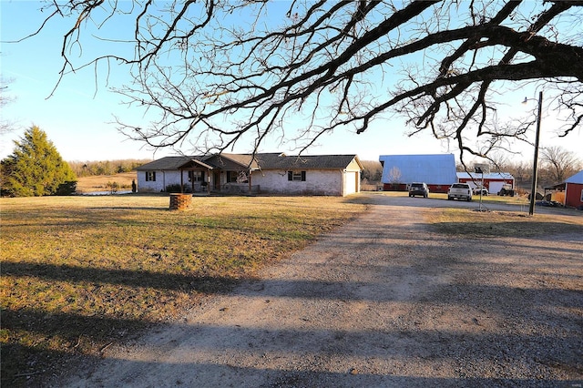 1988 Ripley Route Cc, Doniphan, MO 63935 - view of front of home featuring driveway and a front lawn