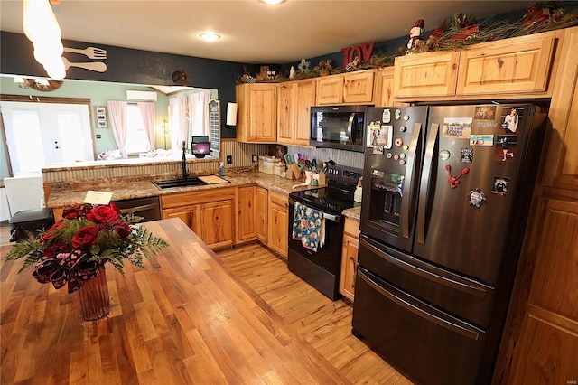1988 Ripley Route Cc, Doniphan, MO 63935 - kitchen with black appliances, a sink, light wood-type flooring, recessed lighting, and light brown cabinetry