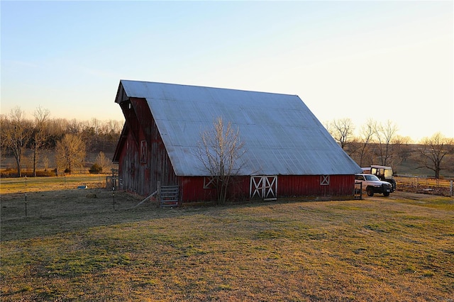 1988 Ripley Route Cc, Doniphan, MO 63935 - outdoor structure at dusk featuring a barn, an outdoor structure, and a lawn