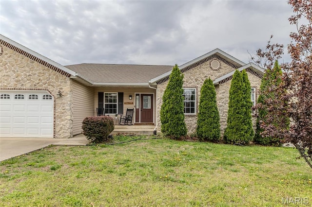 single story home featuring stone siding, a porch, concrete driveway, a garage, and a front lawn