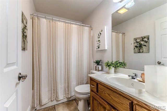 bathroom with tile patterned flooring, toilet, vanity, and a shower with curtain