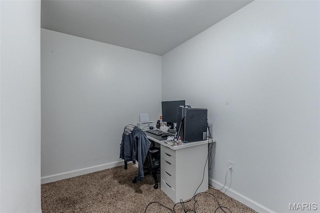 home office featuring light carpet and baseboards