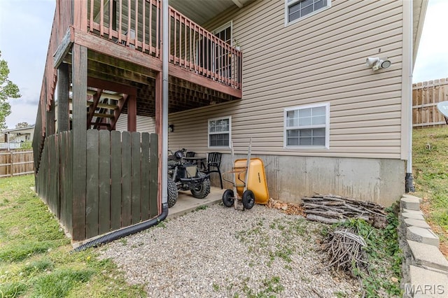 back of property with fence