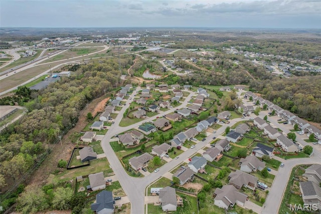 aerial view of property's location featuring nearby suburban area