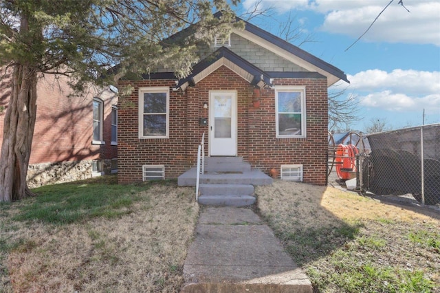 4644 Minnesota Ave, Saint Louis, MO 63111 - bungalow-style house with entry steps and brick siding