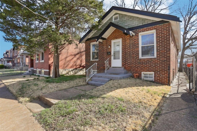 4644 Minnesota Ave, Saint Louis, MO 63111 - bungalow-style home featuring brick siding and entry steps