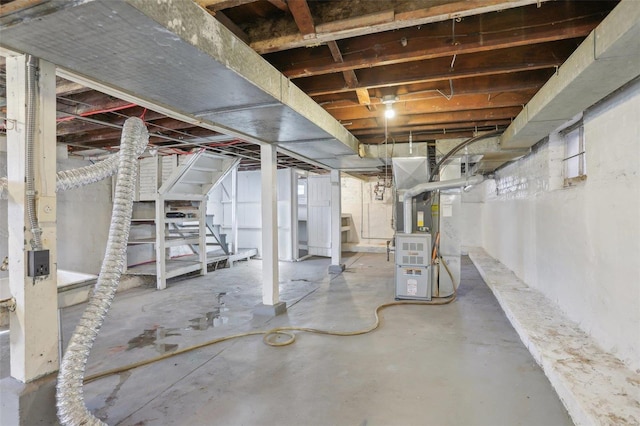 4644 Minnesota Ave, Saint Louis, MO 63111 - below grade area featuring heating unit and stairs