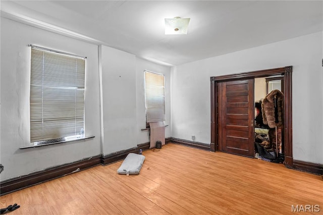 3737 Cottage Ave, Saint Louis, MO 63113 - spare room with light wood-type flooring and baseboards
