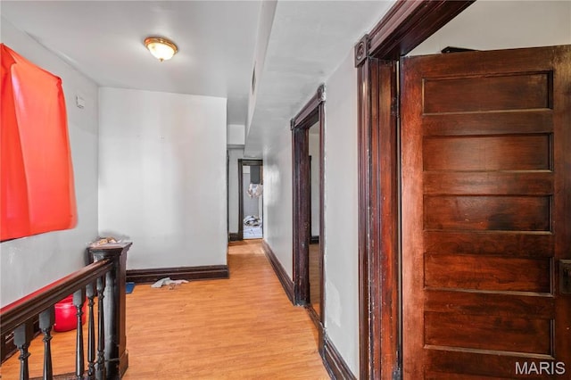 3737 Cottage Ave, Saint Louis, MO 63113 - hall featuring light wood finished floors and baseboards