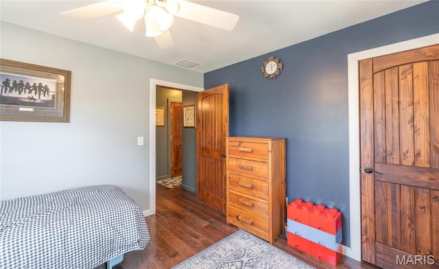5819 Highway Vv Hwy, Vv, MO 65542 - bedroom featuring dark wood finished floors, baseboards, and ceiling fan