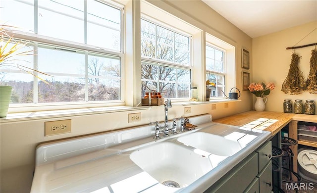 5819 Highway Vv Hwy, Vv, MO 65542 - kitchen featuring plenty of natural light, a sink, and light countertops