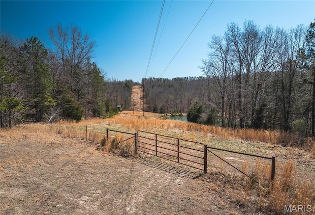 5819 Highway Vv Hwy, Vv, MO 65542 - view of yard with a wooded view, fence, and a view of rural / pastoral area