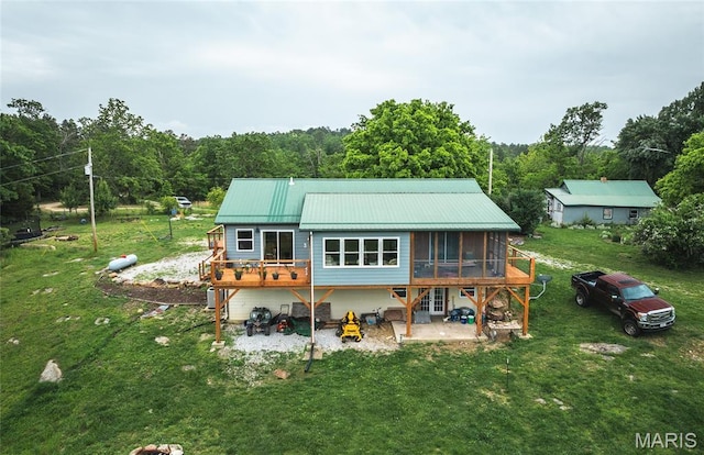 5819 Highway Vv Hwy, Vv, MO 65542 - rear view of property featuring a sunroom, a patio, a yard, and a view of trees