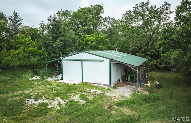 5819 Highway Vv Hwy, Vv, MO 65542 - view of pole building featuring a view of trees and a yard