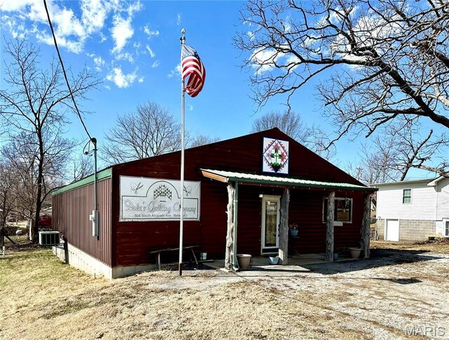504 Alvarado Ave, Belle, MO 65013 - view of front of house featuring central air condition unit