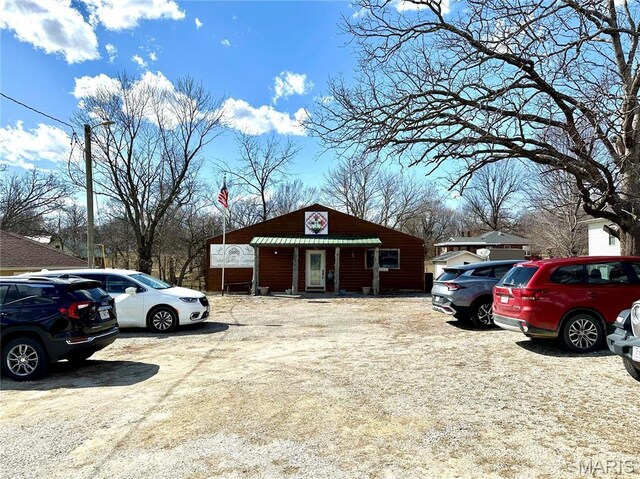504 Alvarado Ave, Belle, MO 65013 - view of front of house with uncovered parking and metal roof