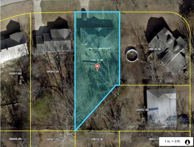 aerial map of property and surrounding area with property parcel outlined