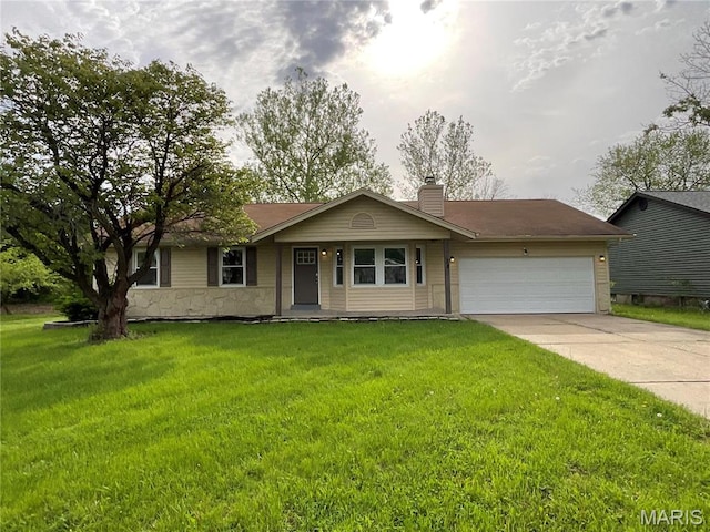 38 N Lang Dr, Ofallon, MO 63366 - single story home with an attached garage, a chimney, concrete driveway, and a front lawn