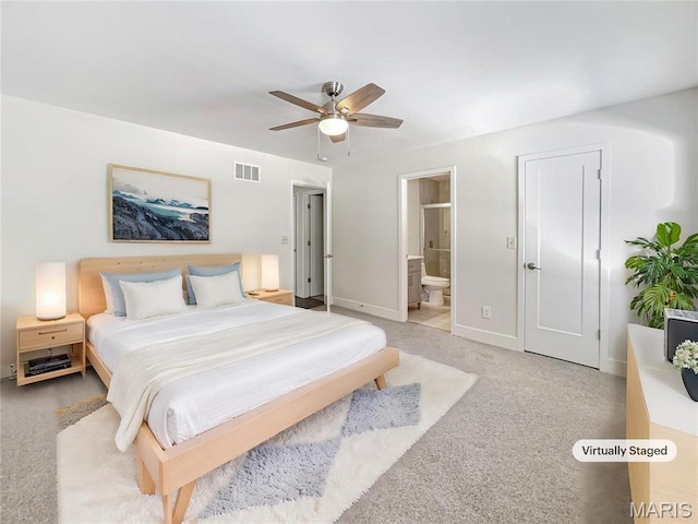 38 N Lang Dr, Ofallon, MO 63366 - bedroom with light carpet, ensuite bathroom, and ceiling fan