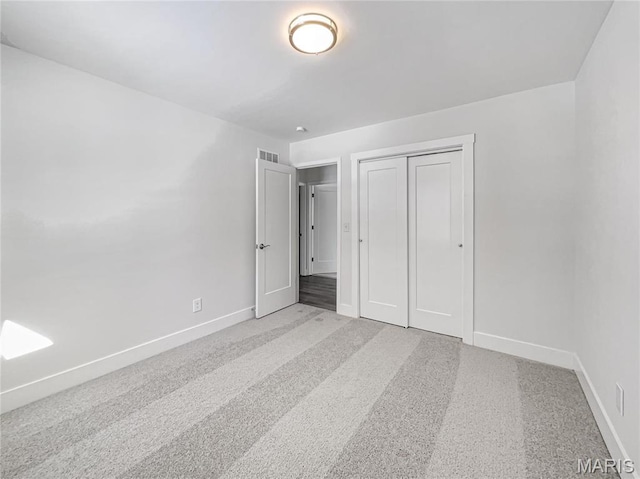 38 N Lang Dr, Ofallon, MO 63366 - unfurnished bedroom with baseboards and a closet