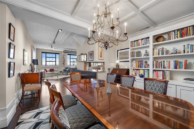 dining area featuring wood finished floors, beam ceiling, a chandelier, and coffered ceiling