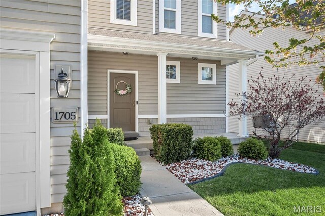 1705 Belleau Wood Dr, Saint Peters, MO 63376 - doorway to property with a porch and a shingled roof