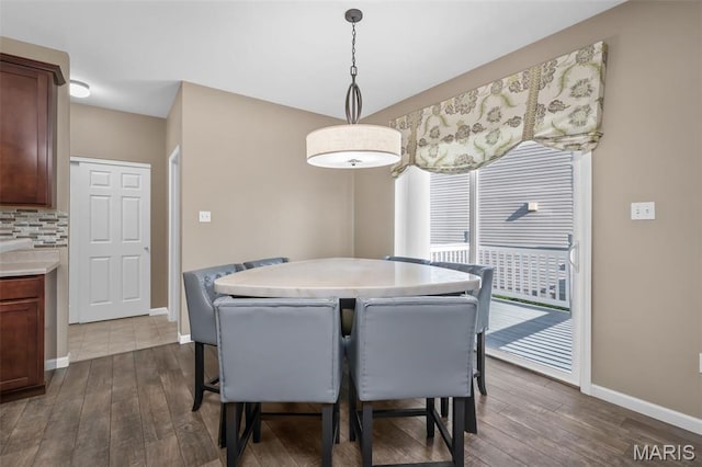 1705 Belleau Wood Dr, Saint Peters, MO 63376 - dining area featuring baseboards and dark wood-style floors