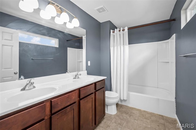 1705 Belleau Wood Dr, Saint Peters, MO 63376 - bathroom featuring toilet, shower / tub combo, and double vanity