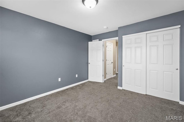 1705 Belleau Wood Dr, Saint Peters, MO 63376 - unfurnished bedroom featuring carpet, baseboards, and a closet