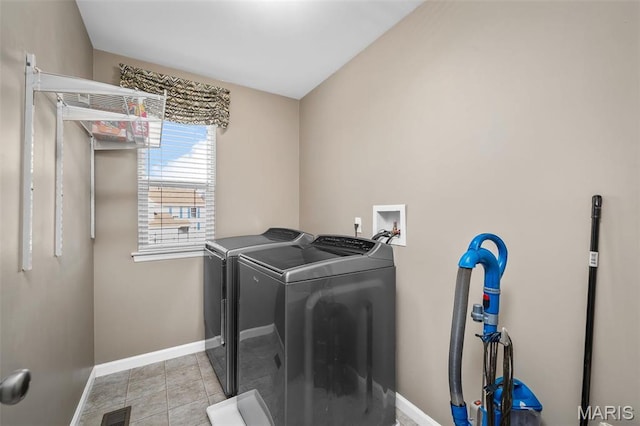 1705 Belleau Wood Dr, Saint Peters, MO 63376 - clothes washing area with washing machine and clothes dryer and baseboards