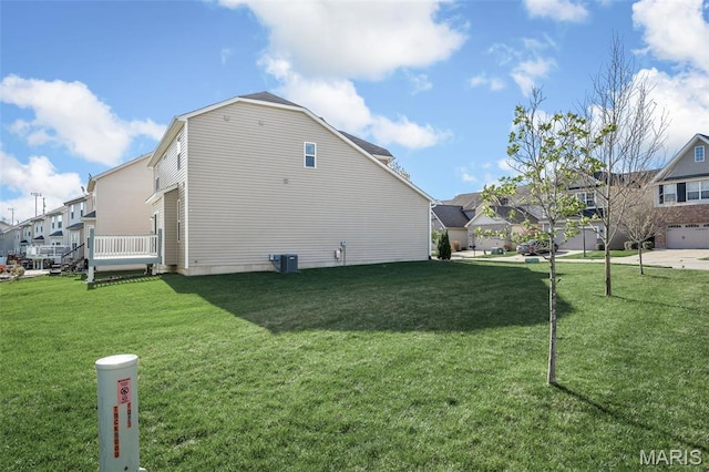 1705 Belleau Wood Dr, Saint Peters, MO 63376 - view of side of home featuring a residential view and a yard