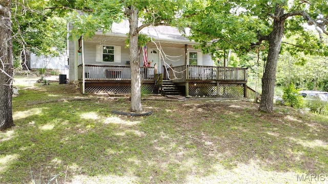 338 Mont Pellier St, Bonne Terre, MO 63628 - view of front of property featuring a porch and central AC unit