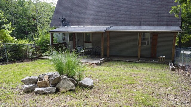 338 Mont Pellier St, Bonne Terre, MO 63628 - back of house featuring a shingled roof and a wooden deck