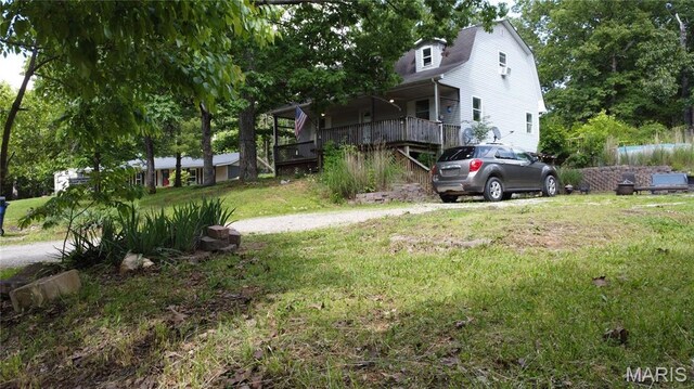 338 Mont Pellier St, Bonne Terre, MO 63628 - view of green lawn featuring covered porch