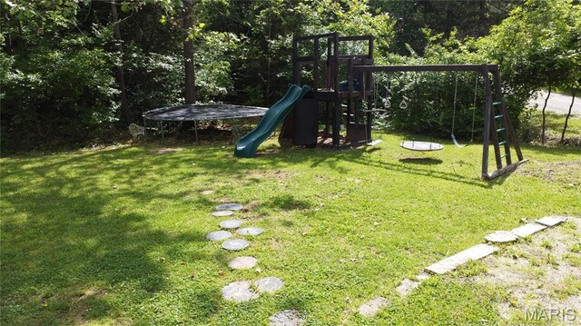 338 Mont Pellier St, Bonne Terre, MO 63628 - view of play area with a lawn