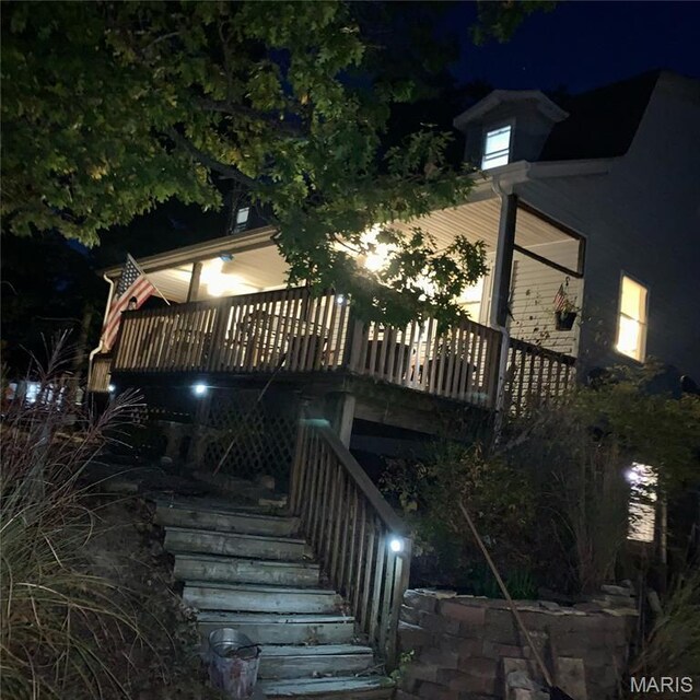 338 Mont Pellier St, Bonne Terre, MO 63628 - deck at night featuring stairs