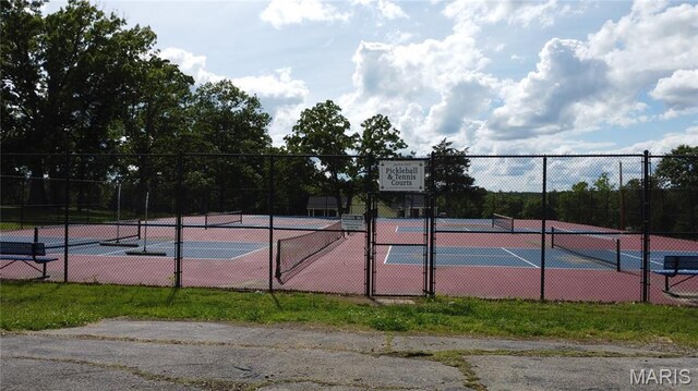 338 Mont Pellier St, Bonne Terre, MO 63628 - view of tennis court with a gate