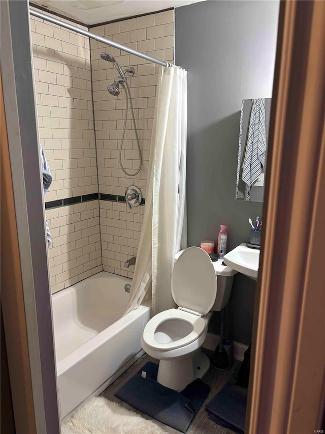 2803 Semple Ave, Saint Louis, MO 63120 - full bathroom with toilet and shower / bathtub combination with curtain