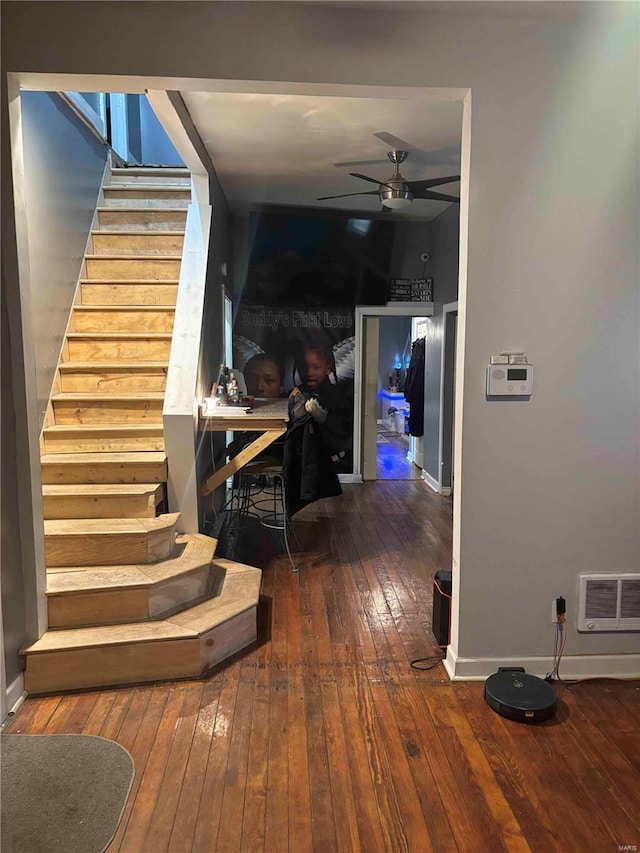 2803 Semple Ave, Saint Louis, MO 63120 - hallway with hardwood / wood-style flooring, stairway, and baseboards