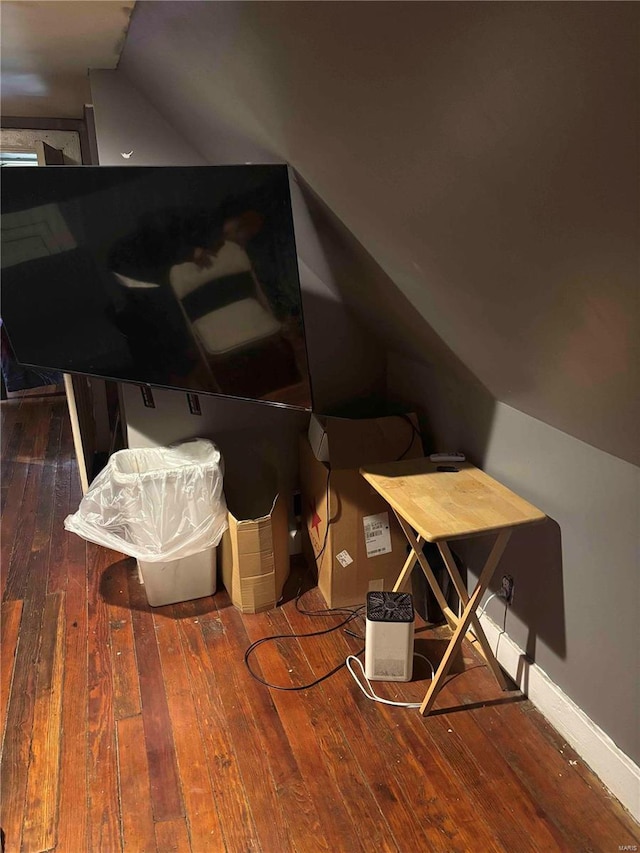 2803 Semple Ave, Saint Louis, MO 63120 - additional living space with wood-type flooring, vaulted ceiling, and baseboards