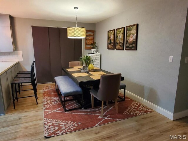 1028 County Road 606, Cape Girardeau, MO 63701 - dining space with light wood-style flooring and baseboards