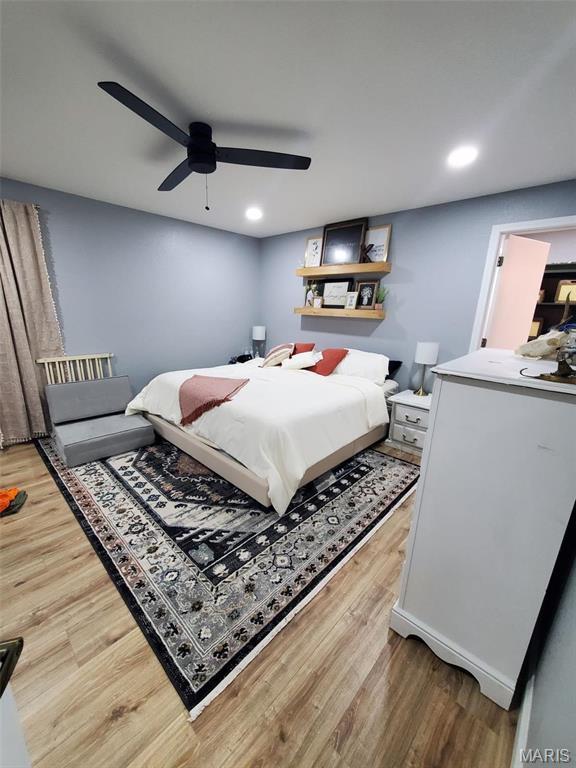 1028 County Road 606, Cape Girardeau, MO 63701 - bedroom with wood finished floors, a ceiling fan, and recessed lighting