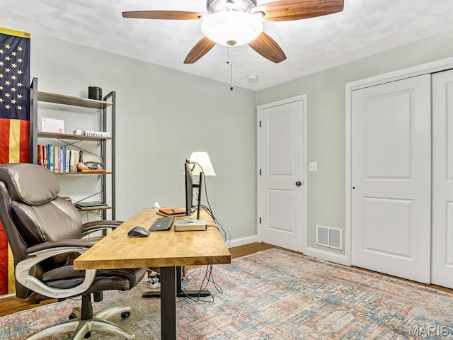 103 Evergreen Ct, Waterloo, IL 62298 - office featuring ceiling fan, baseboards, and wood finished floors