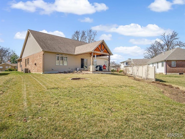 103 Evergreen Ct, Waterloo, IL 62298 - back of house featuring a patio area, central air condition unit, and brick siding