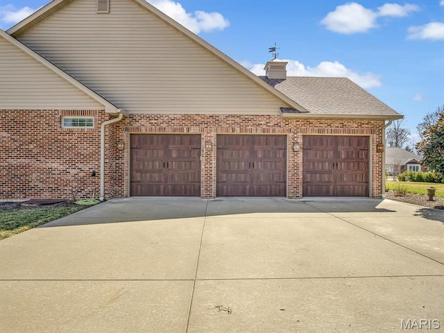 103 Evergreen Ct, Waterloo, IL 62298 - garage with concrete driveway